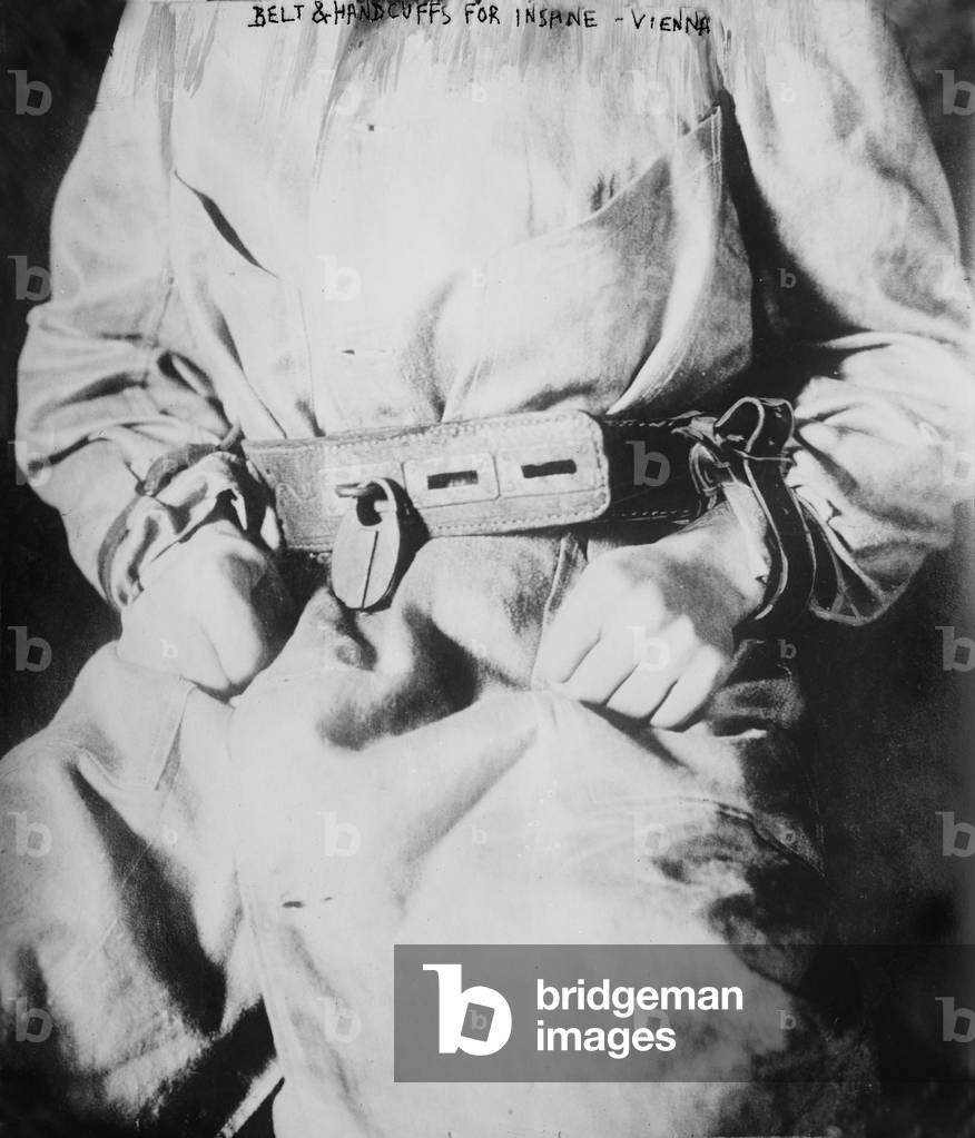 Detail of belt and handcuffs on an insane person, Fool's Tower (aka The Narrenturm), Vienna, Austria, c.1900-1920s
