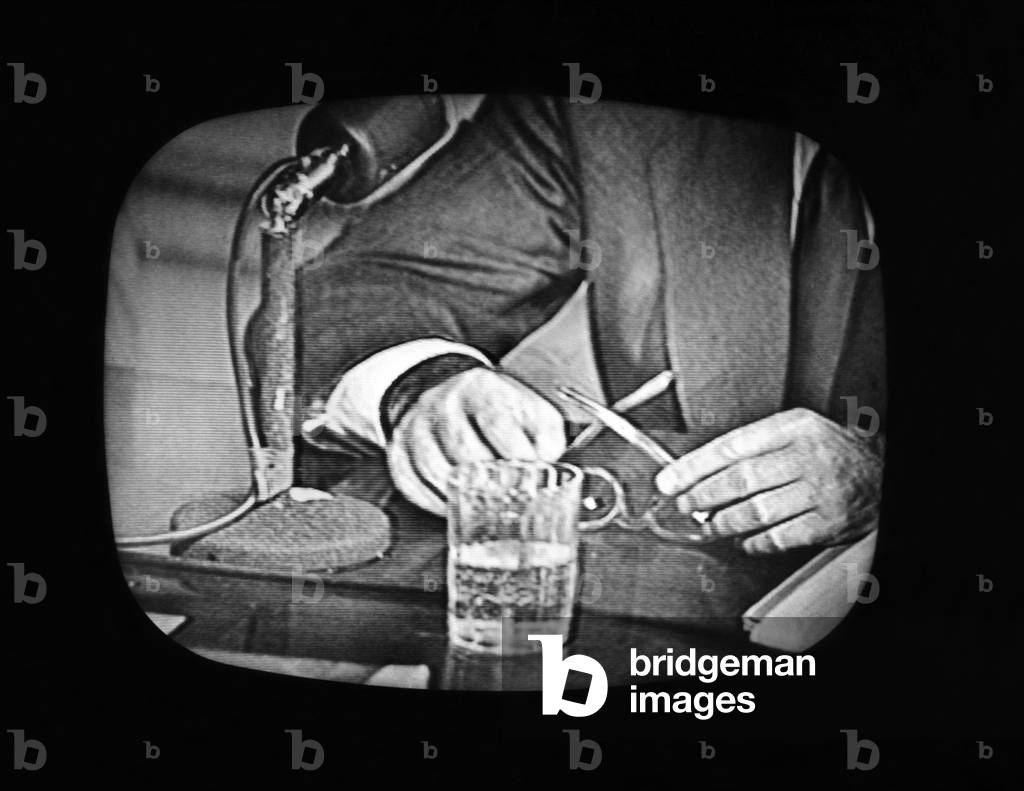 Frank Costello's hands on TV during Kefauver hearings. The Kefauver Committee hearings were televised, providing many Americans with their first glimpse of organized crime in the US. c. March 10-20, 1951
