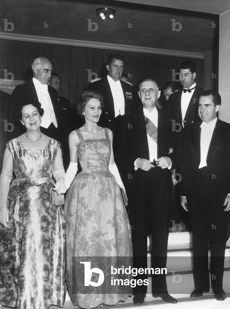 Vice President and Pat Nixon at a dinner given by the French President Charles DeGaulle. At the French Embassy, Washington, D.C. April 25, 1960