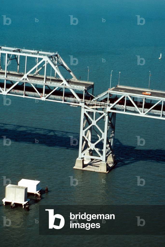 Loma Prieta Earthquake collapsed the roadbed of the San Francisco-Oakland Bay Bridge. October 17 1989