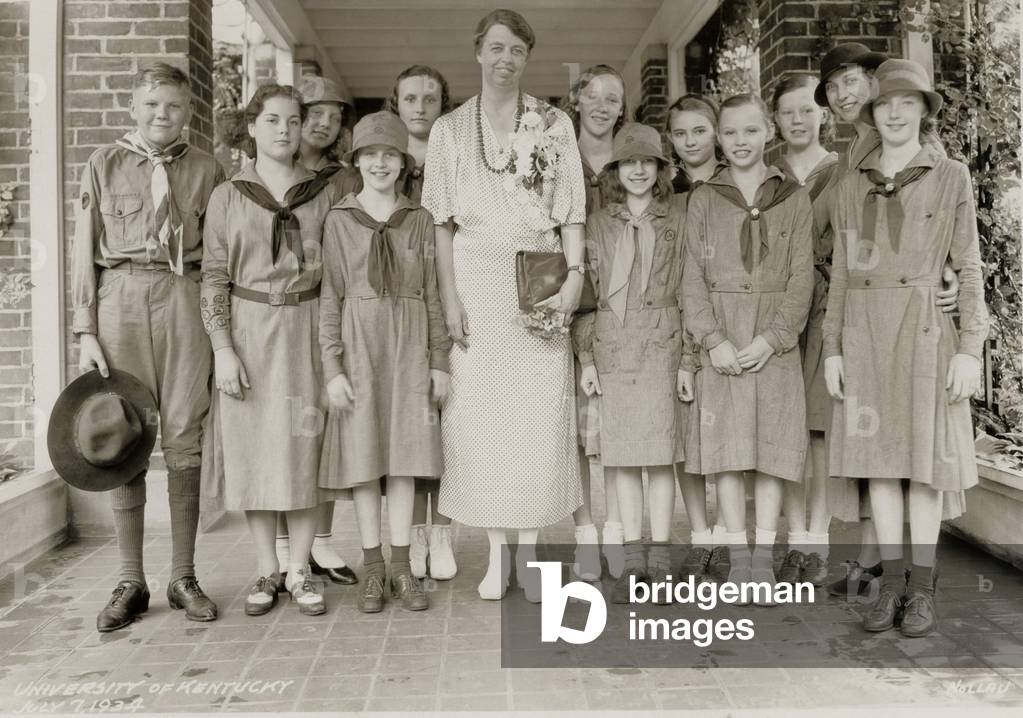 Eleanor Roosevelt with Girl Scouts of Lexington, Kentucky. 1934. A solitary Boy scout stands at left