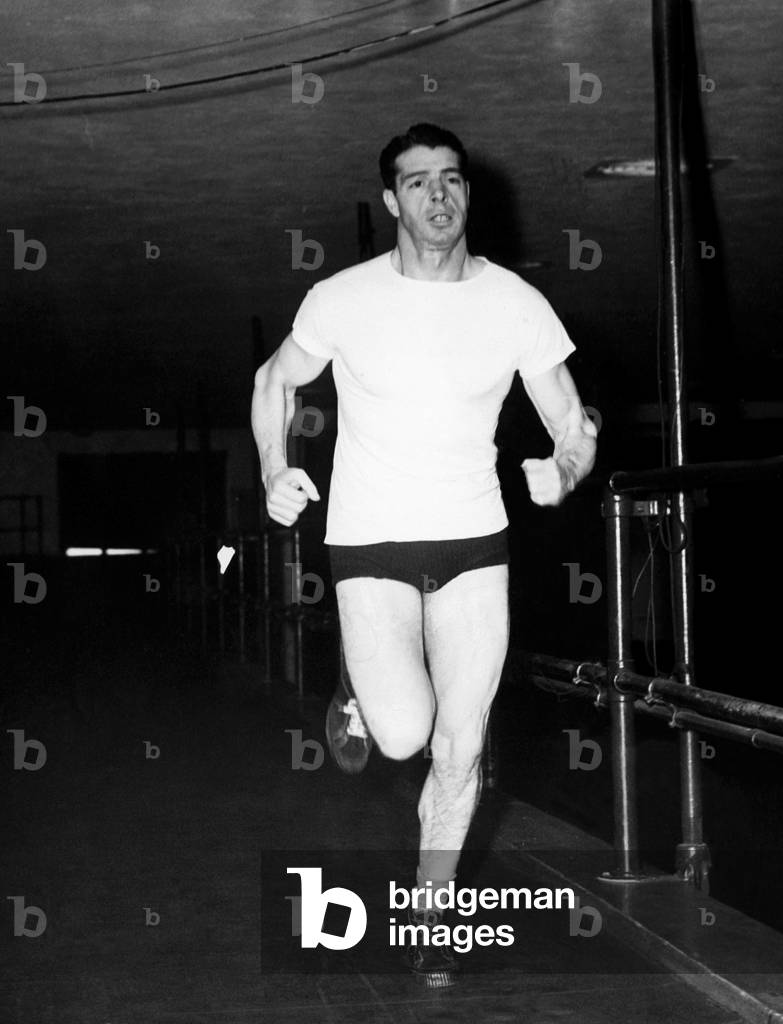 Joe DiMaggio gets into shape before spring training, December 1945