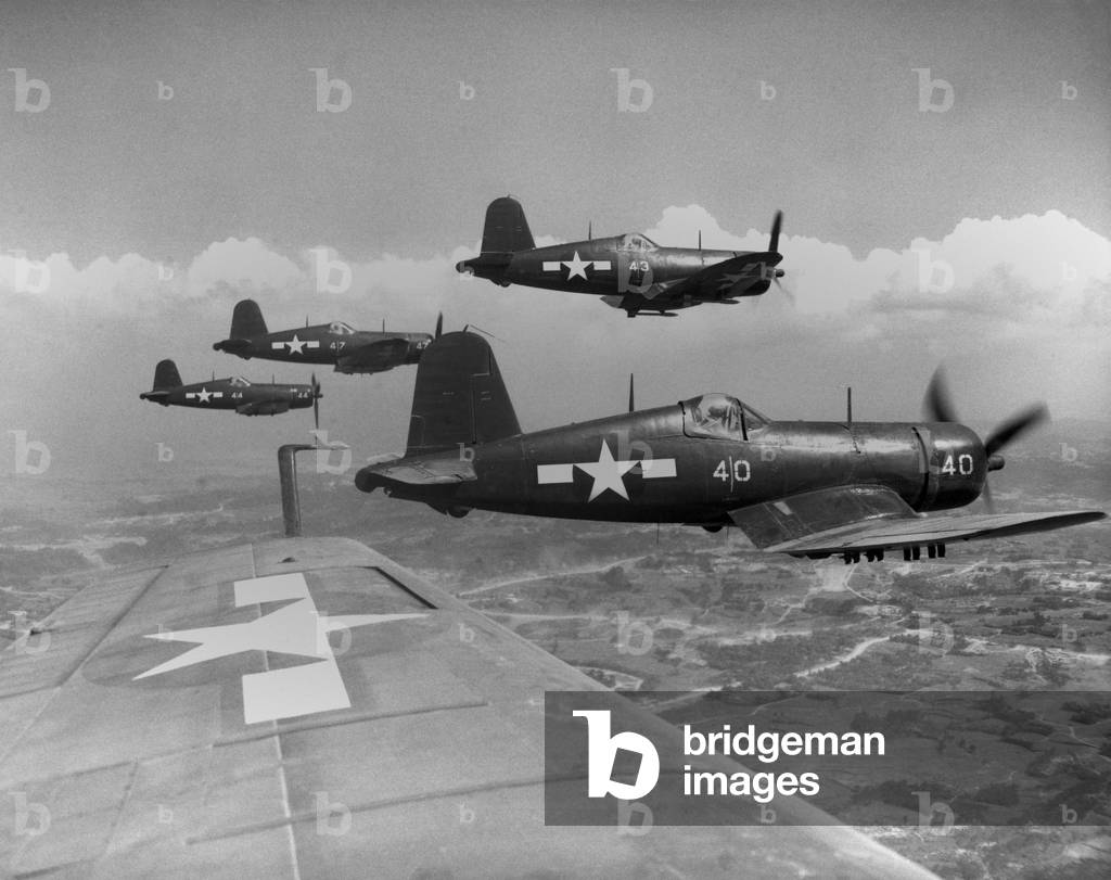 Marine Corsairs fly on a rocket strike against Japanese positions on southern Okinawa. June 10, 1945. World War 2
