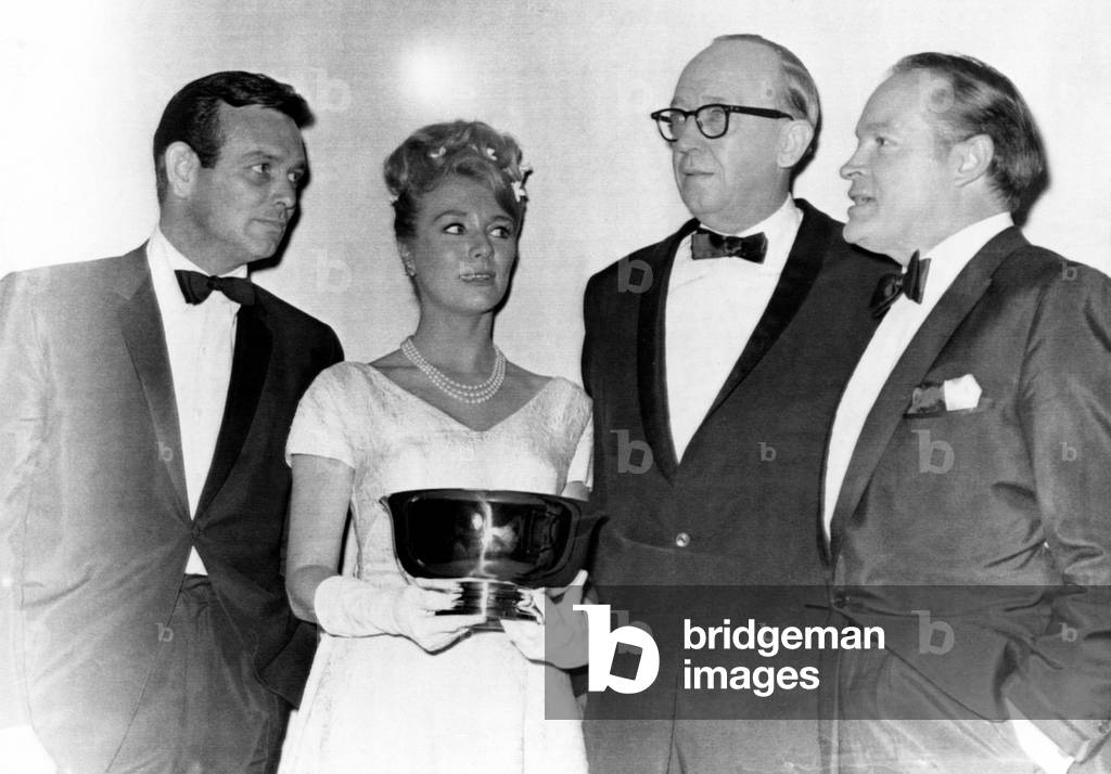 David Janssen and Inger Stevens with their award for Favorite Male and Female TV Performers at the TV Guide Awards. They are joined by TV Guide Publisher James T. Quirk and show MC Bob Hope, Hollywood, CA, April 17, 1964