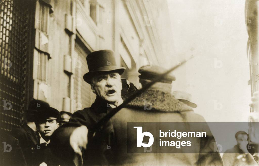 John Pierpont Morgan (1837-1913), American financier, striking photographer with cane on May 11, 1910