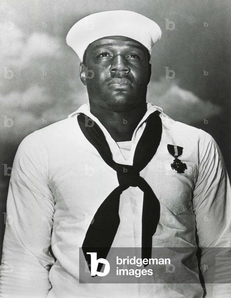 Doris 'Dorie' Miller was awarded the Navy Cross for heroism during attack on Pearl Harbor. He was one of the first heroes of World War 2 for saving the lives of fellow sailors on the USS West Virginia and defending the ship with anti-aircraft guns. May 27, 1942
