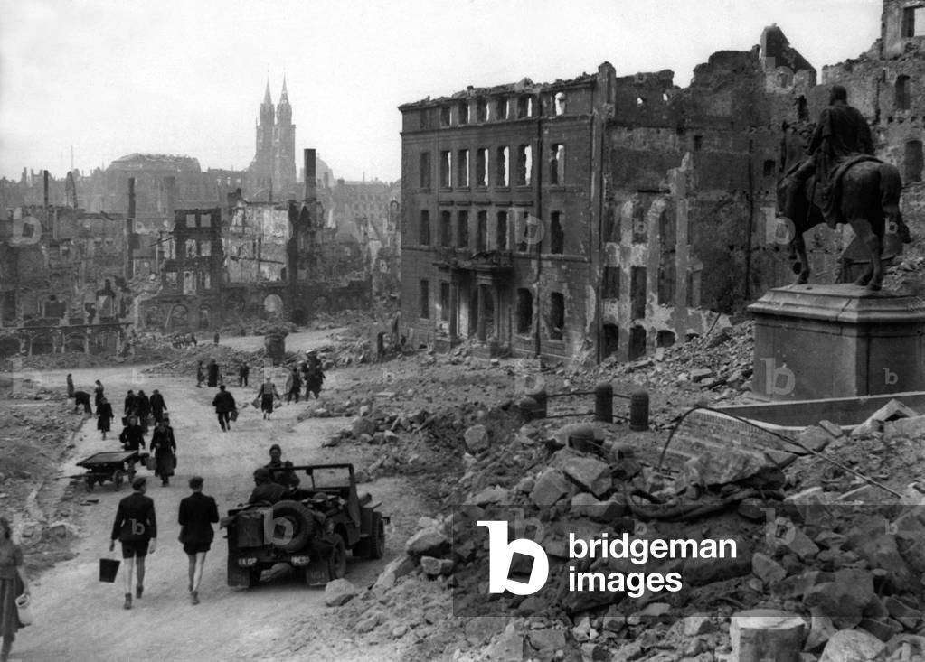 Bavarian city of Nuremberg following its capture by U.S. Army in a battle of April 17-21, 1945. In the distance, is the twin-spired Lorenz Church; on the right surrounded with rubble, is a statue of Kaiser William I. World War 2
