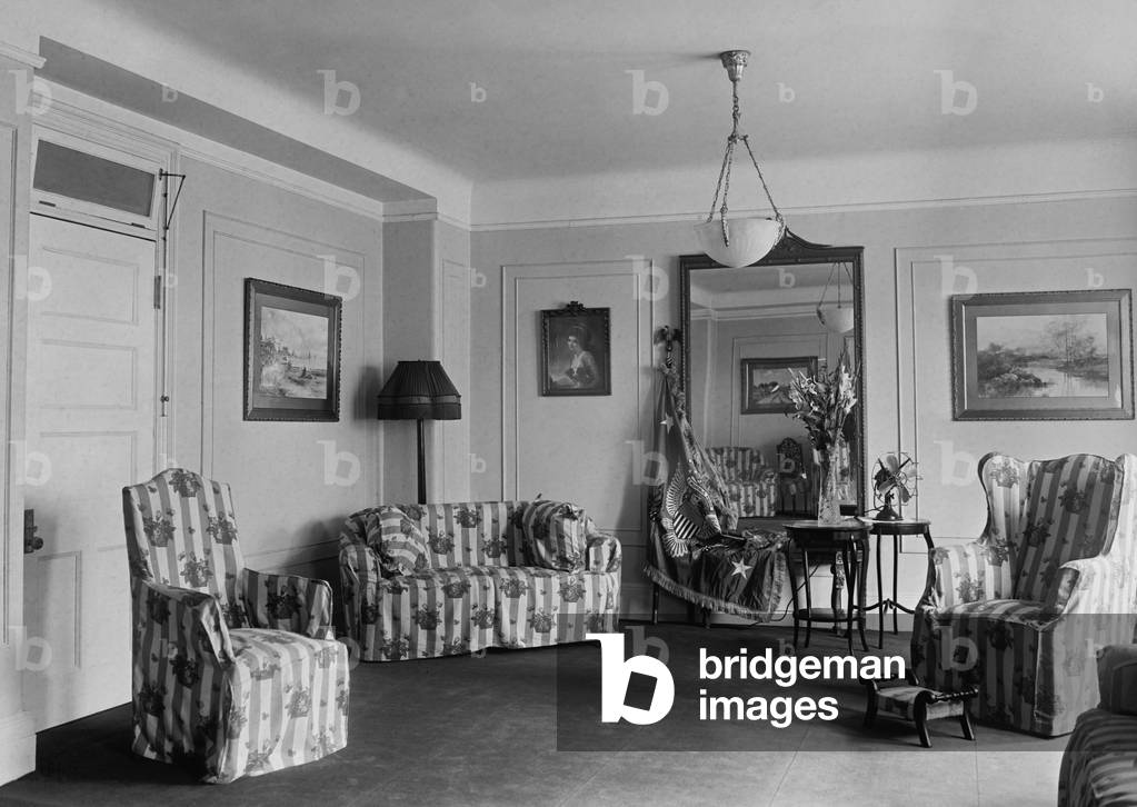Vice President Coolidge's family residence at the Willard Hotel, on August 3, 1923. A Presidential flag is draped near the mirror, since this became the residence of the U.S. President when Warren Harding died the previous day
