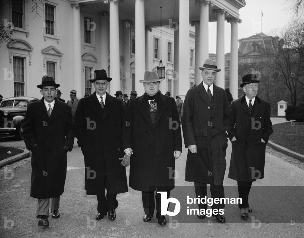 Capital and Labor leaders leaving the White House after a conference with President Roosevelt From left to right:; A.A. Berle, former Brain Truster of the New Deal, Philip Murray, C.I.O. leader, John L. Lewis, C.I.O. chief, Owen D. Young, head of the General Electric Co. and Thomas W. Lamont, partner of J.P. Morgan. January 14, 1938
