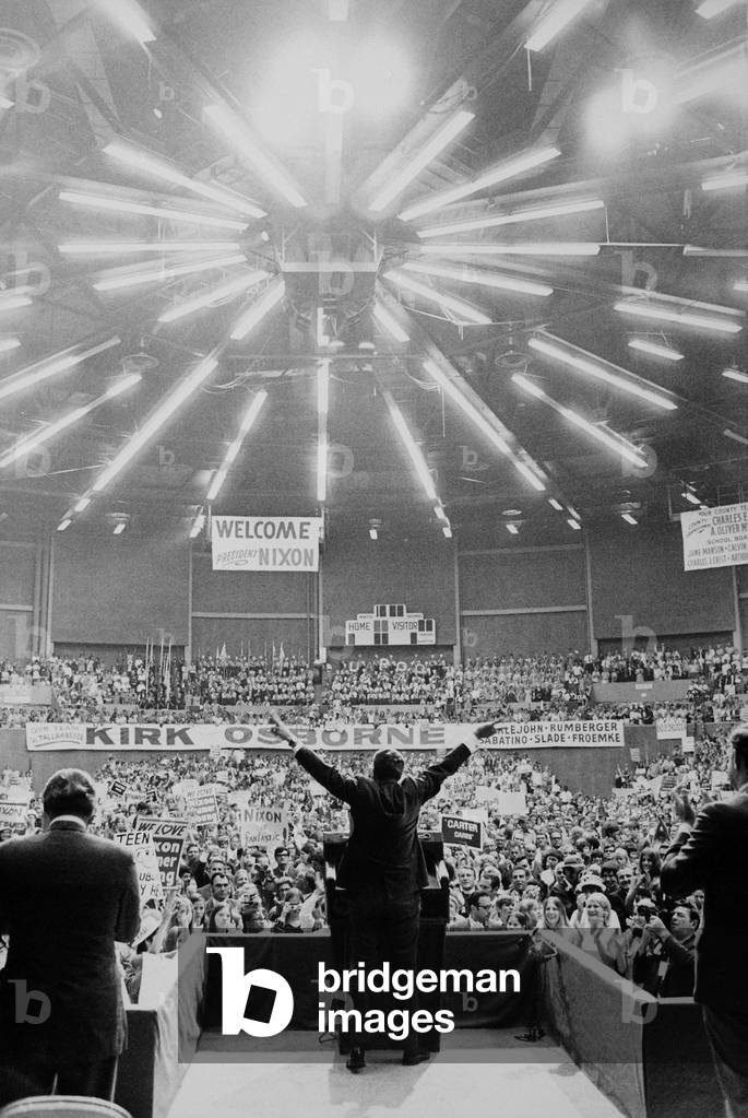 President Richard Nixon making his signature 'V' gesture while speaking to a Florida crowd. c. 1969-74