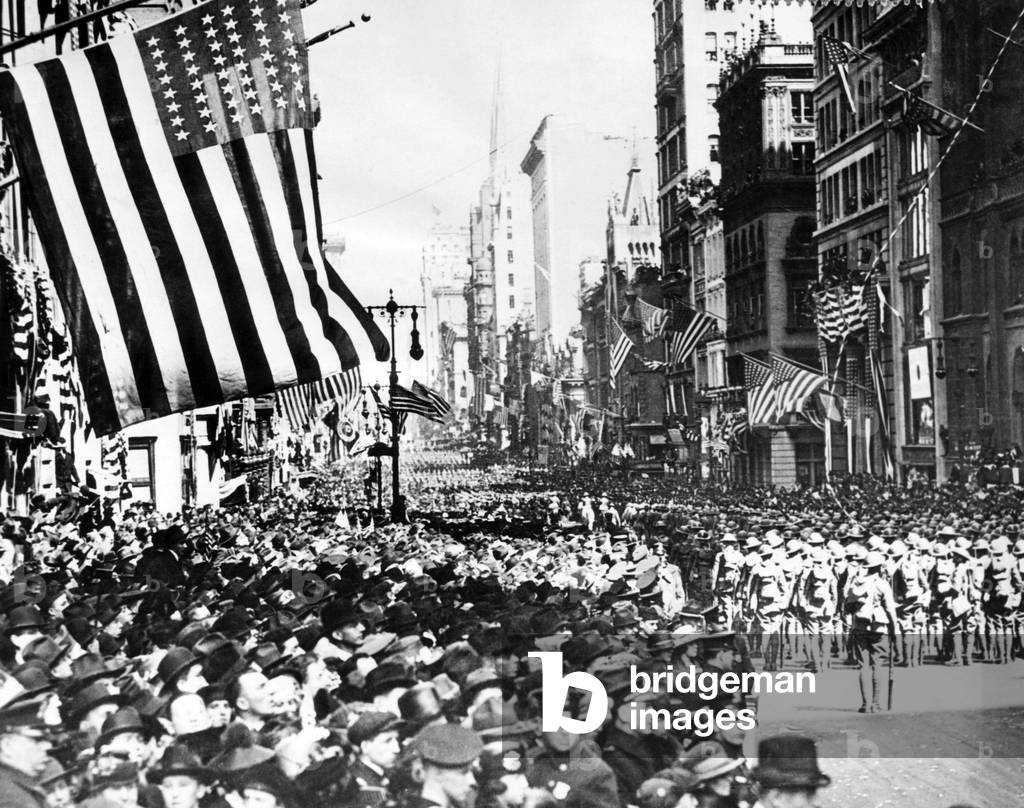 Returning U.S. troops marching up Fifth Avenue after the armistice and their return from France, New York, c. 1910's.