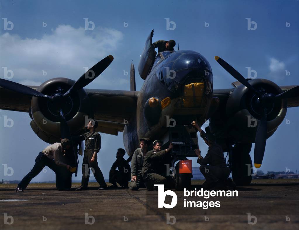 World War II, servicing an A-20 bomber, photograph by Alfred T. Palmer, Langley Field, Viginia, July, 1942