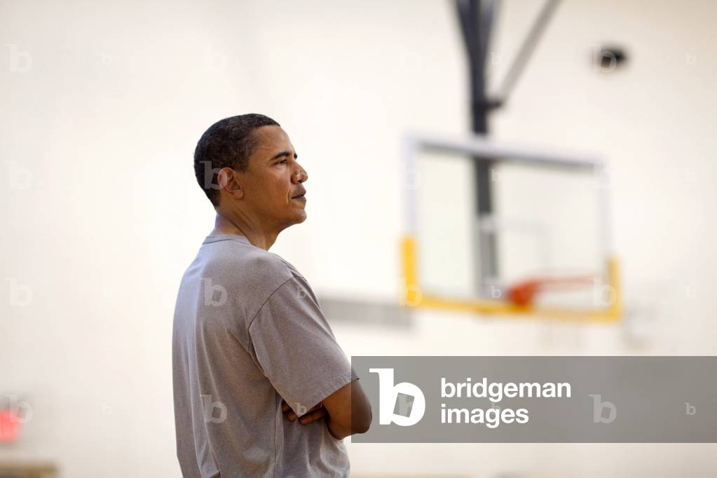 President Barack Obama watches the action during a break from playing basketball at Fort McNair in Washington D.C. on Saturday May 9 2009.,