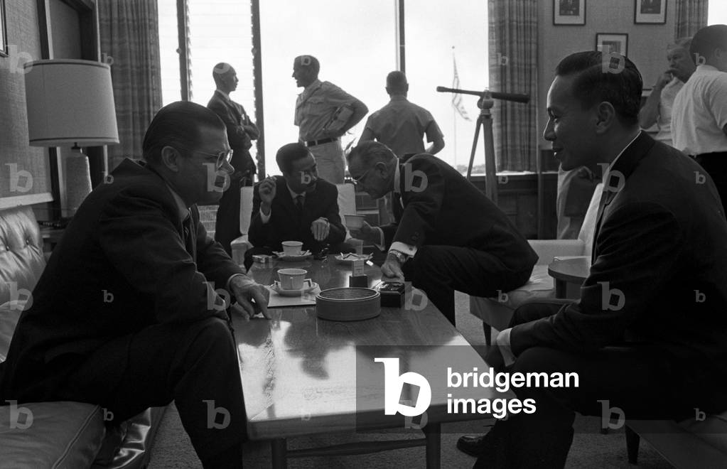 Honolulu Conference on the Vietnam War. Robert S. McNamara speaks with Prime Minister Nguyen Cao Ky. In the background, President Johnson talks with Lt. Gen. Nguyen Van Thieu. Feb. 8, 1966