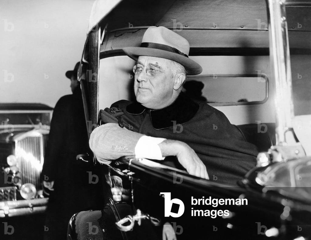 President Franklin Roosevelt riding in a car. March 1936