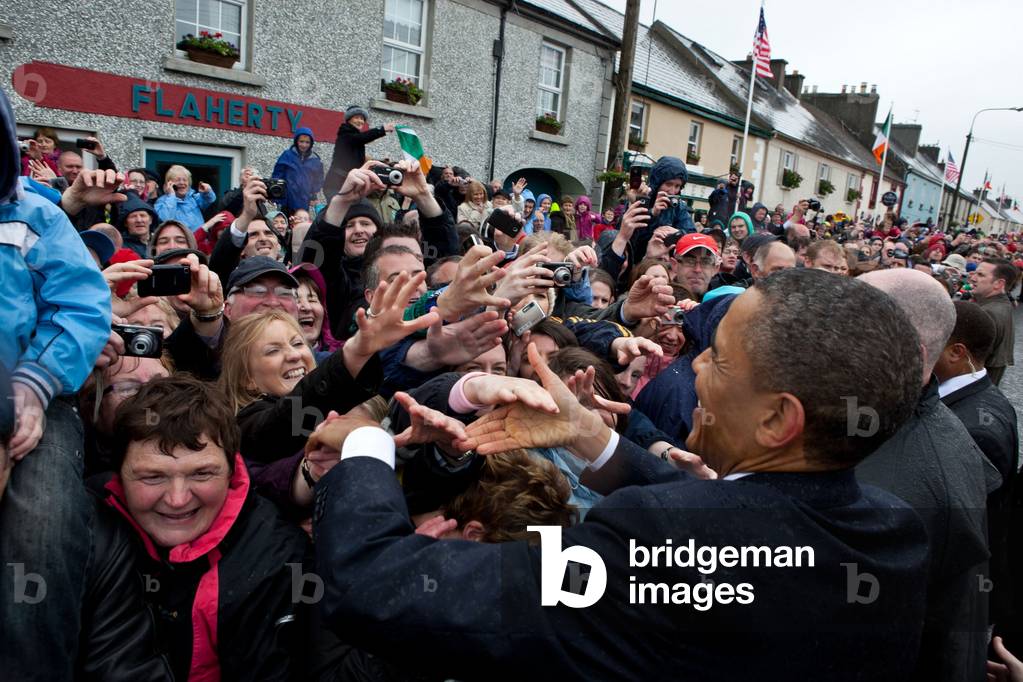 President Barack Obama greets local residents on Main Street in Moneygall, Ireland, May 23, 2011