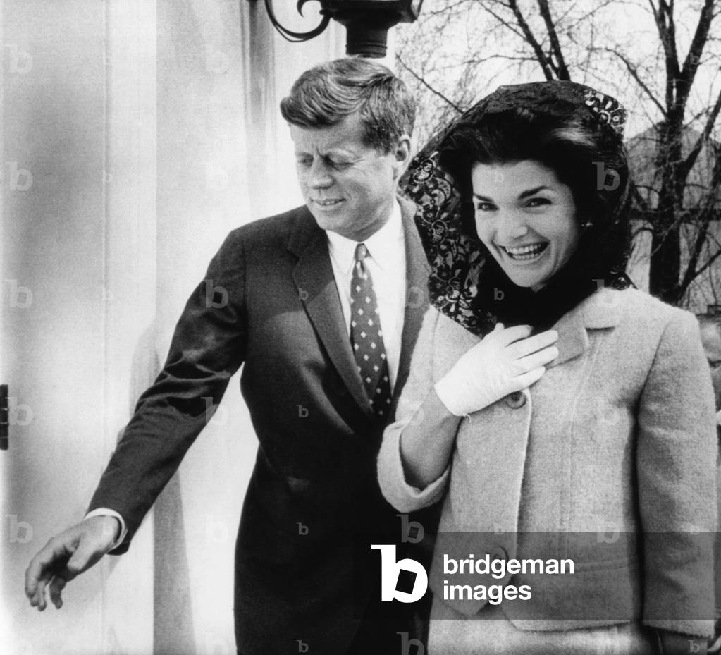 John F. Kennedy, Jacqueline Kennedy, arriving at Middleburg Community Center for Mass, Middleburg, Virginia, April 1, 1962