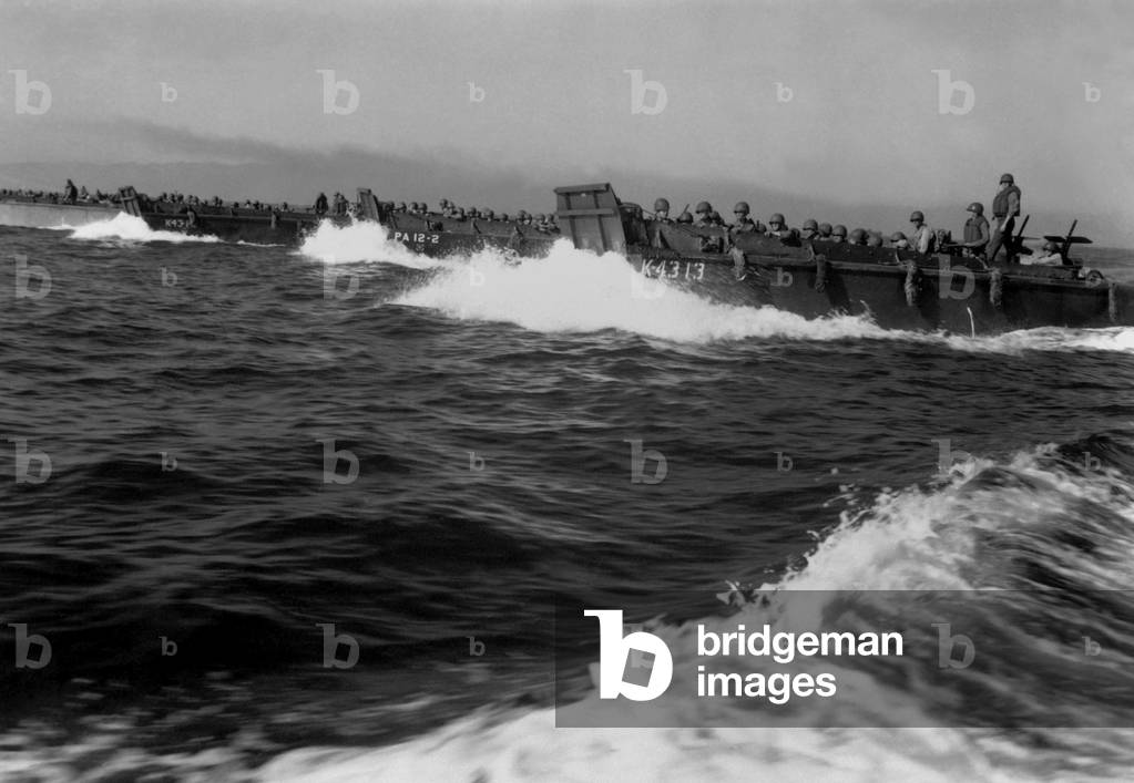 Landing barges, in Lingayen Gulf, carry the first wave of U.S. invaders to the beaches of Luzon. Jan 9. 1945. Japanese forces had already retreated inland and offered no resistance. Philippine Invasion, World War 2