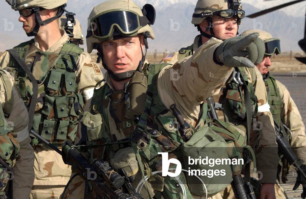 Soldiers from 504th Parachute Infantry Regiment of the 82nd Airborne Division conduct a Quick Reaction Force mission at Bagram Airfield in Kabul Afghanistan. Quick reaction forces respond to threats within 15 minutes. Jan. 8 2002., Photo by:Everett Collection