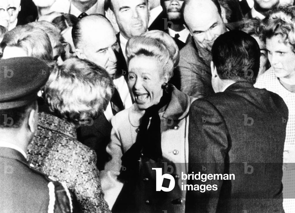 Atty. General John Mitchell and wife Martha, greet the Nixons on their return from Europe. October 5, 1970. The President and First Lady were returning from a 12,000 mile European trip which took them to Italy, the Vatican, the Sixth Fleet in the Mediterranean, Yugoslavia, Spain, Britain and Ireland