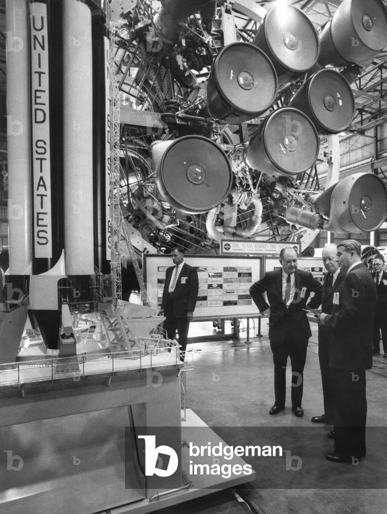 Eisenhower and Director Werhner von Braun talk in the Fabrication and Assembly Engineering Division. Sept. 8, 1960. President Eisenhower traveled to Huntsville to dedicate the George C. Marshall Space Center.