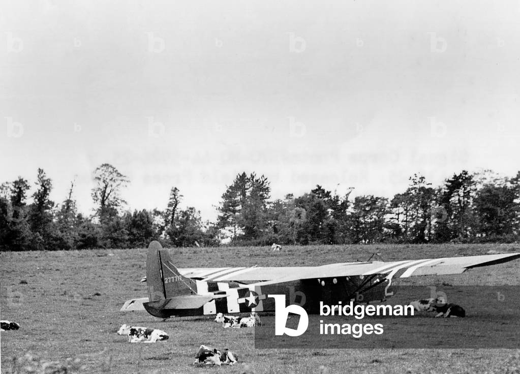 U. S. Air Force Glider that landed intact in Normandy on D-Day, June 6, 1944. The abandoned glider remained in the cow pasture after Airborne troops left for their missions, and pilots worked their way back to the Normandy beaches. World War 2