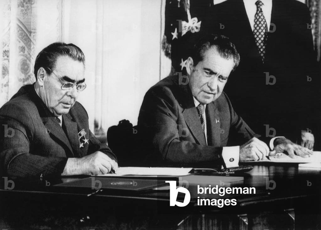 Nixon Presidency. Soviet Premier Leonid Brezhnev signs nuclear arsenal treaty as US President Richard Nixon looks on, Washington, D.C., 1973