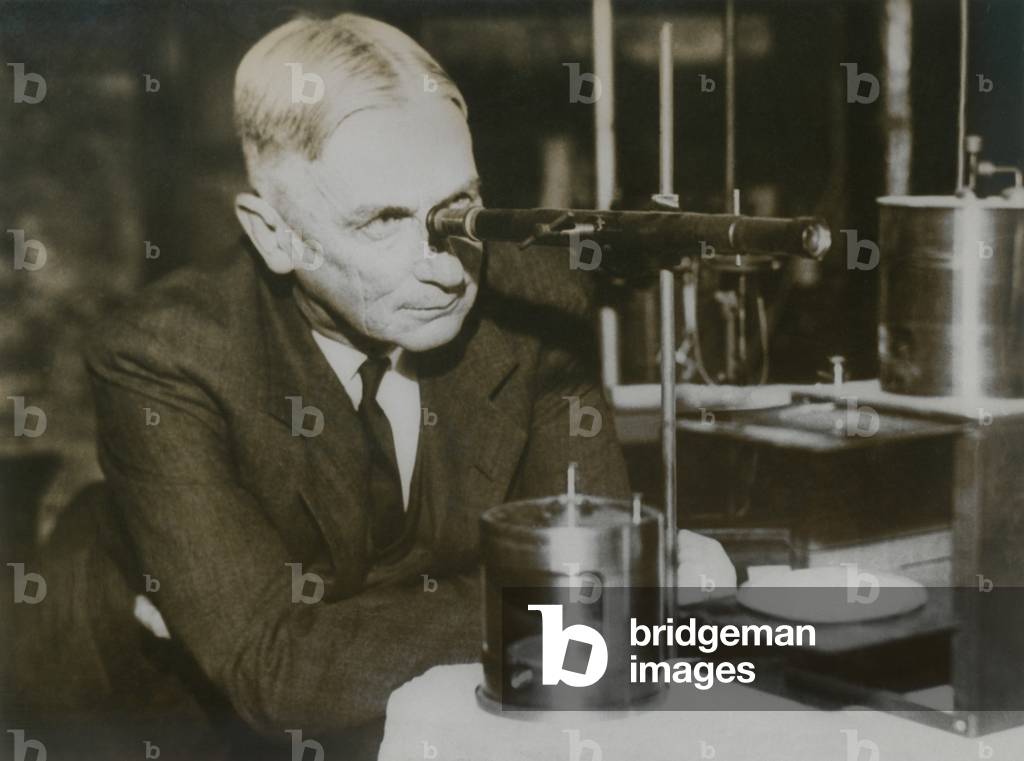 William Harkins, a nuclear physicist, contributed to the discovery of the neutron, a neutrally charged particle in the atomic nucleus. c. 1930s
