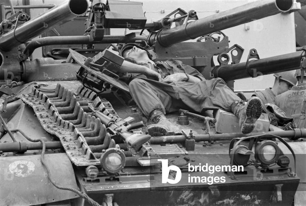 Vietnam War-Tet Offensive. A US Marine relaxes on an Ontos anti-tank vehicle during a break in the fighting at Hue. The 1968 Battle of Hue, was one of the longest battles of the Vietnam War costing US and Allied forces 668 dead and 3,707 wounded. Feb. 23, 1968