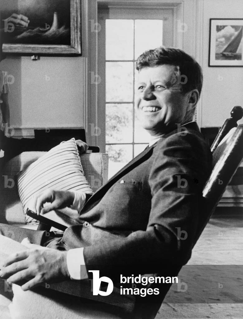 President John F. Kennedy in rocking chair on his 43rd birthday, 1963 (photo)