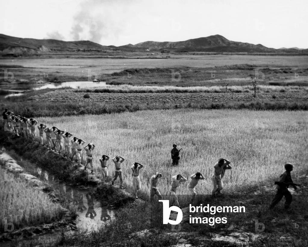 Korean War: U.S. Marines invading North Korea, 1950.