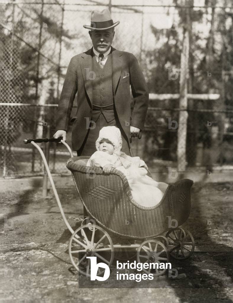 Nicholas Longworth with baby Paulina Longworth at the Washington, D.C. Zoo. Longworth was the Republican Speaker of the House and husband of Alice Roosevelt, daughter of President Theodore Roosevelt