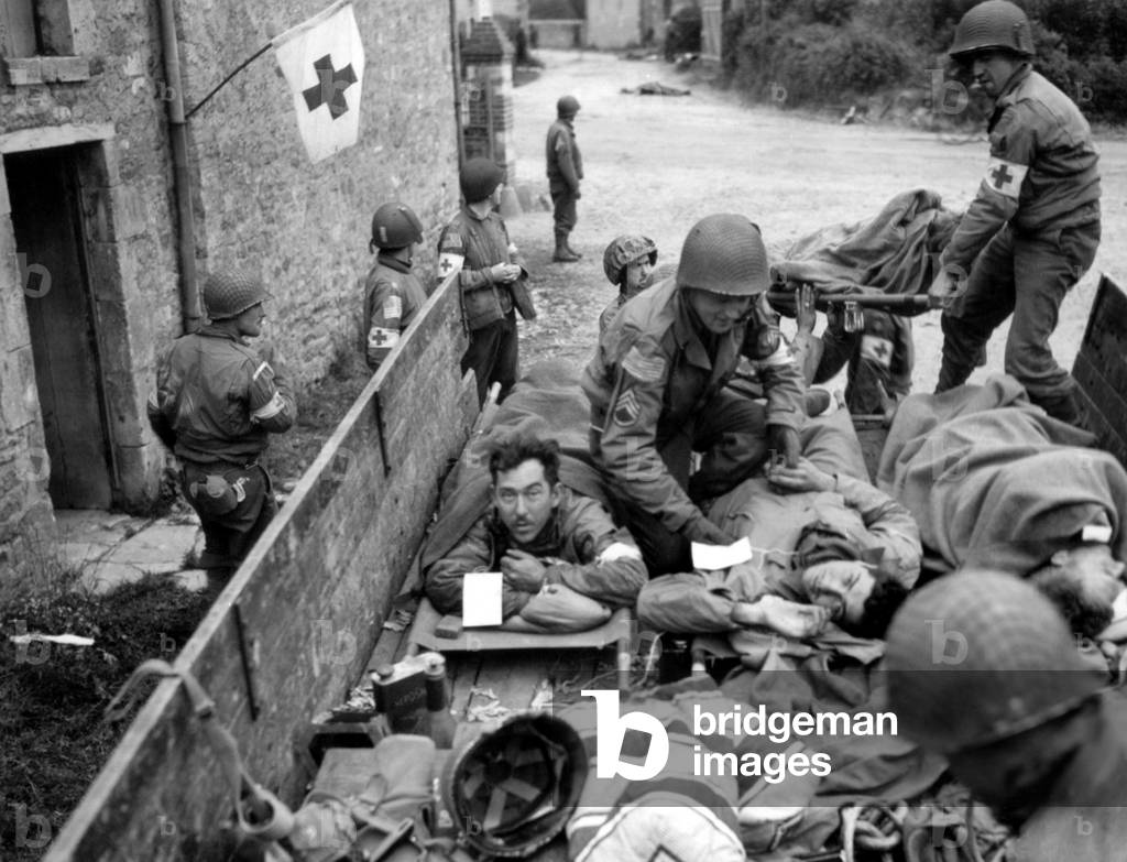Evacuation of U.S. soldiers wounded in the Battle of Saint Lo, July 1944. Normandy Campaign, France, World War 2