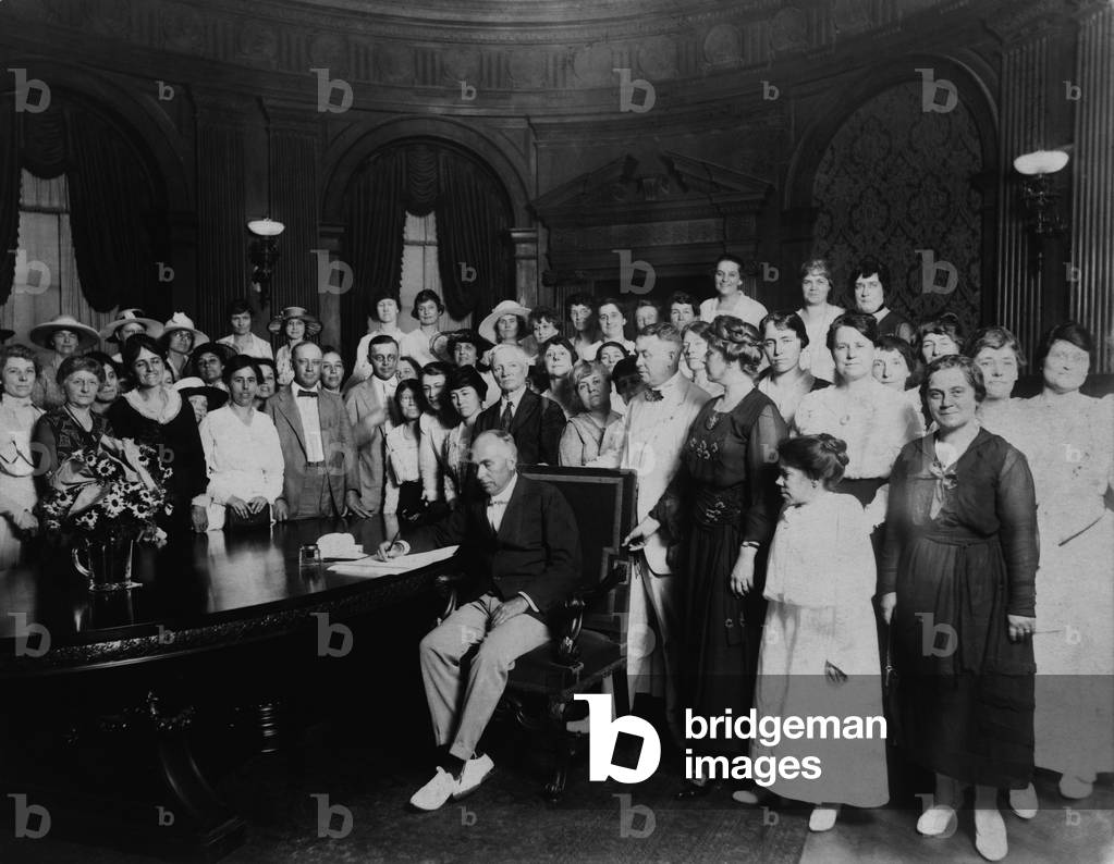 Frederick Gardner: A room full women and a few men witness Governor Frederick Gardner signing Missouri's ratification of the 19th Amendment. Missouri was the 11th state of the required 36 to ratify. January 6, 1920.