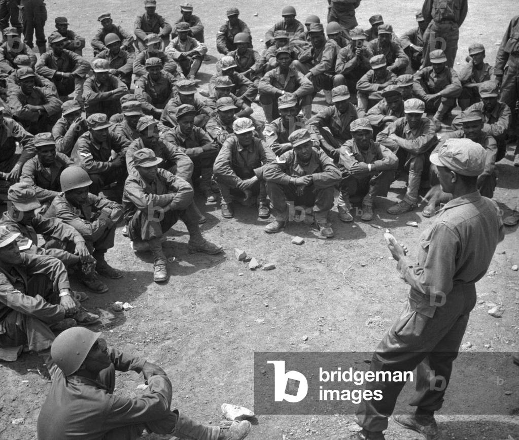 Ethiopian troops training in Korea. UN soldiers are instructed military intelligence by Lt. Solomon Mokria of Addis Ababa. May 1951. Korean War, 1950-53