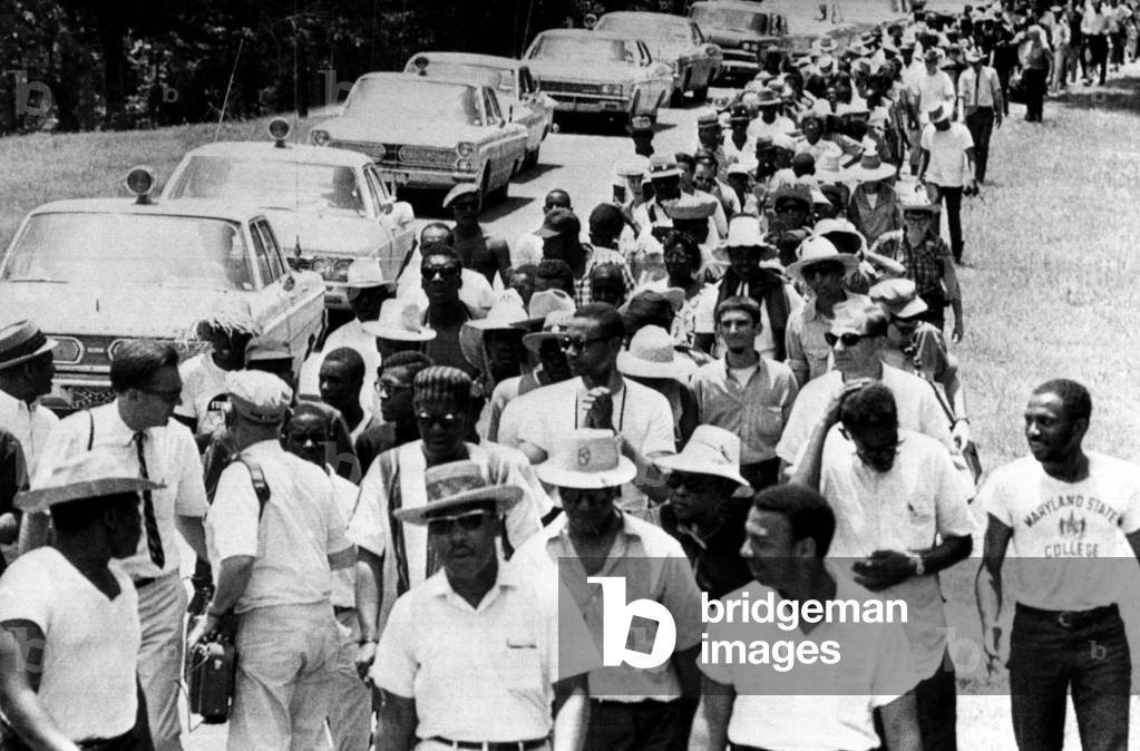 Martin Luther King Jr. (center, foreground), leads his 'Mississippi Freedom Machers' into Yalobusha County, which is said to be one of the roughest counties in the state, Enid, Mississippi, June 12, 1966.