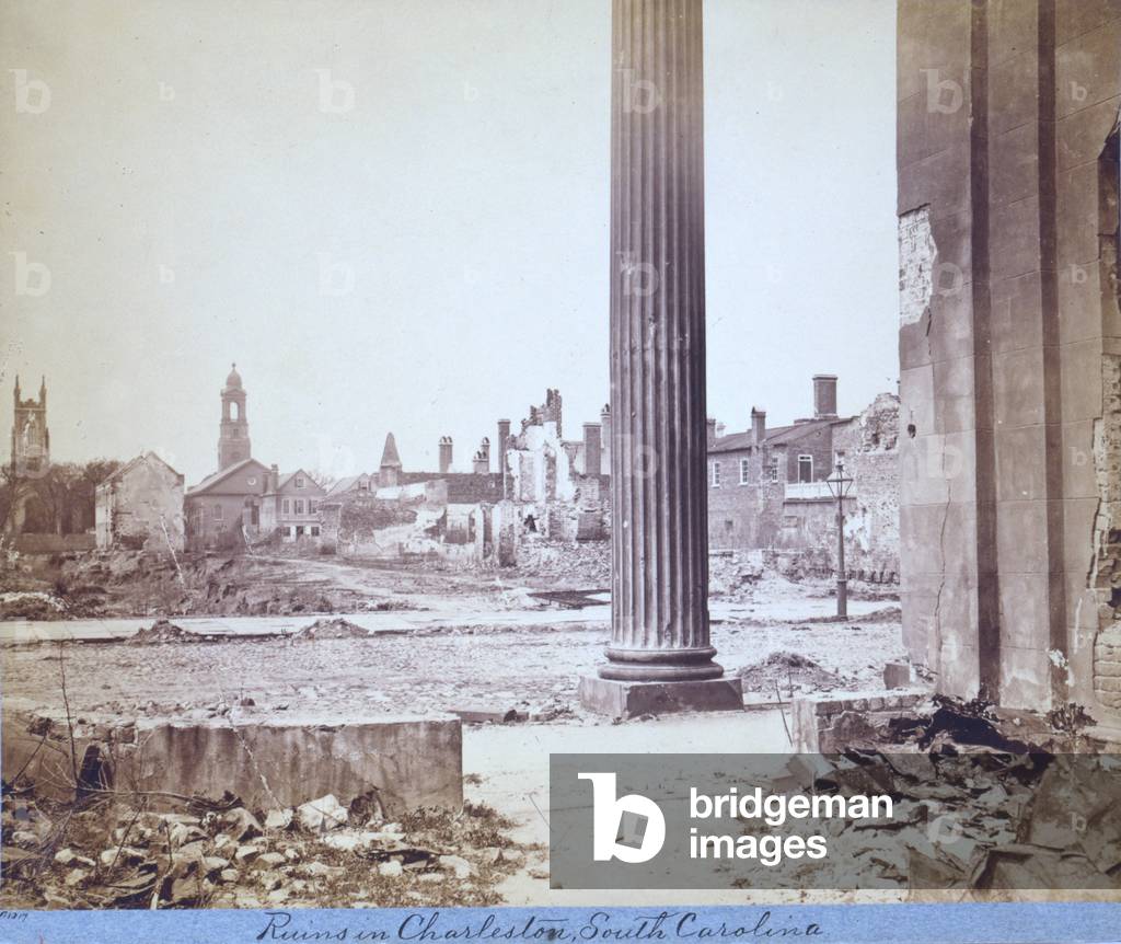 The Civil War, view of ruined buildings through porch of the Circular Church, at 150 Meeting Street, Charleston, South Carolina, 1865