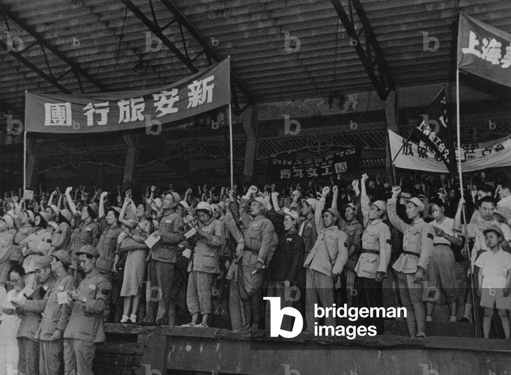 Shanghai commemorates the anniversary of the People's Liberation Army. Soldiers and Communist Party members celebrates in the ancient cynodrome. c. 1940-1950.