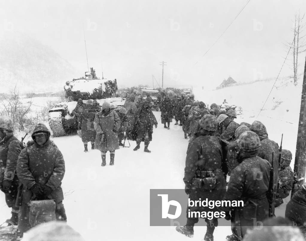First Marine Division takes to the road on withdrawal from Koto-ri, south of the Chosin Reservoir. c. Dec 6-15, 1950. Korean War, 1950-53