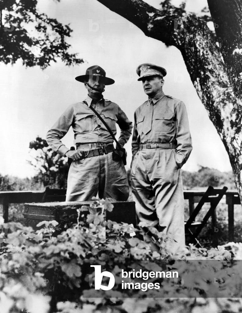Major General Jonathan Wainwright, (1883-1953), General Douglas MacArthur, (1880-1964), at a military function in The Philippines, August, 1945.