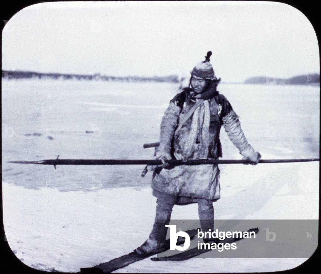 Asia, goldi hunter on skis on ice, lantern slide, photograph by William Henry Jackson, 1895 (b/w photo)