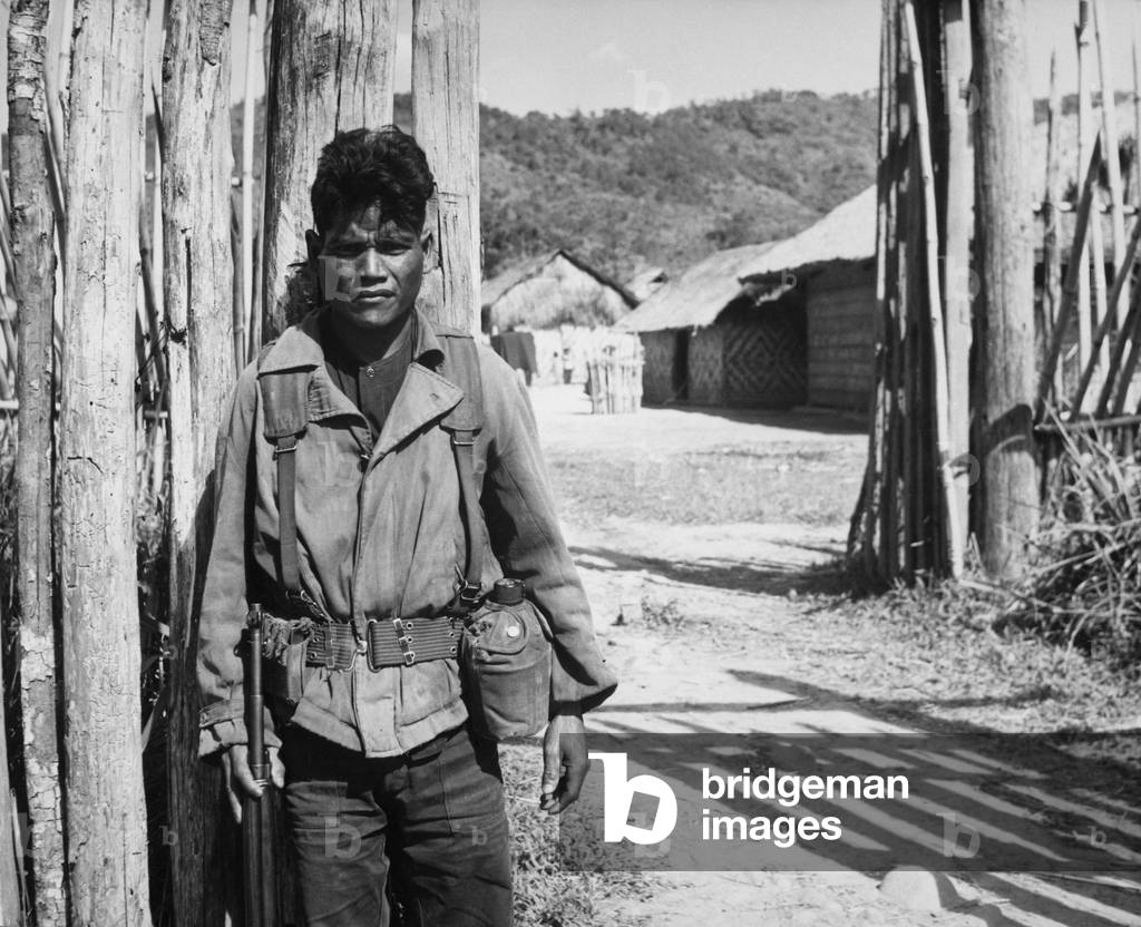 Vietnam War. South Vietnamese soldier guarding a fortification in 1966. Army of the Republic of Vietnam ARVN suffered 220,357 killed from 1965 through 1974