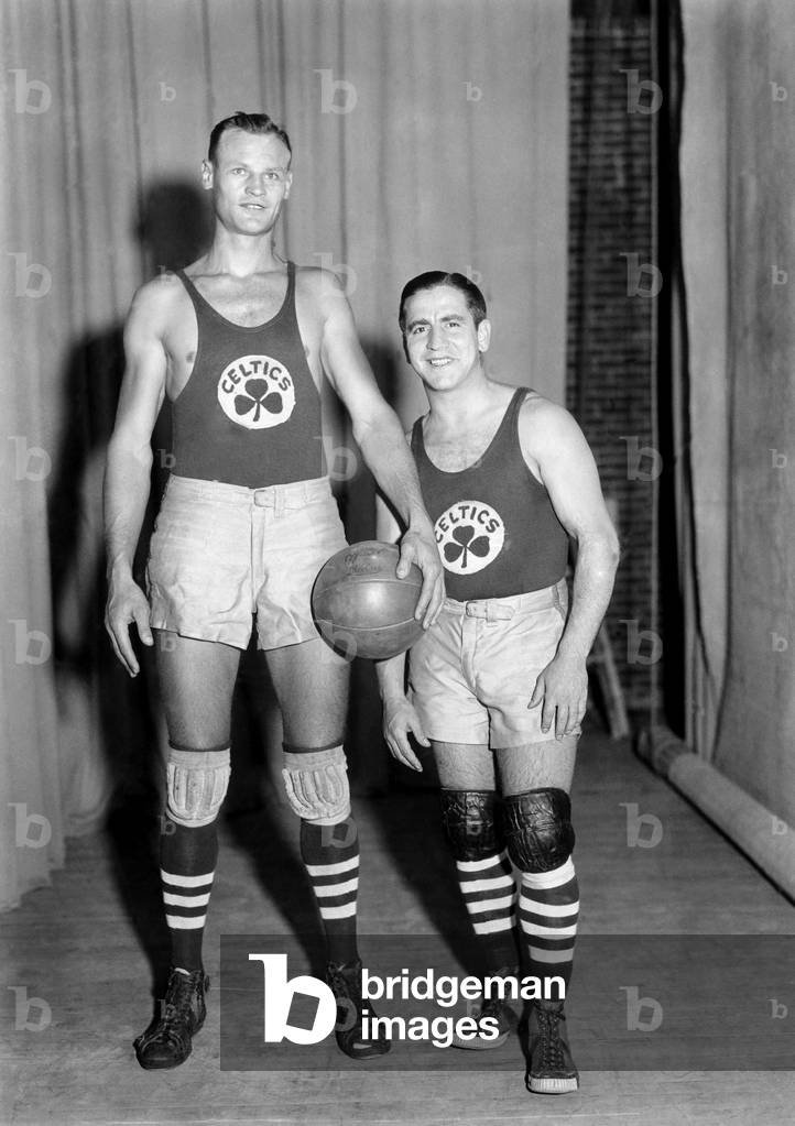 Professional basketball player Joe Lapchick (left), of The Boston Celtics, c. 1930s.