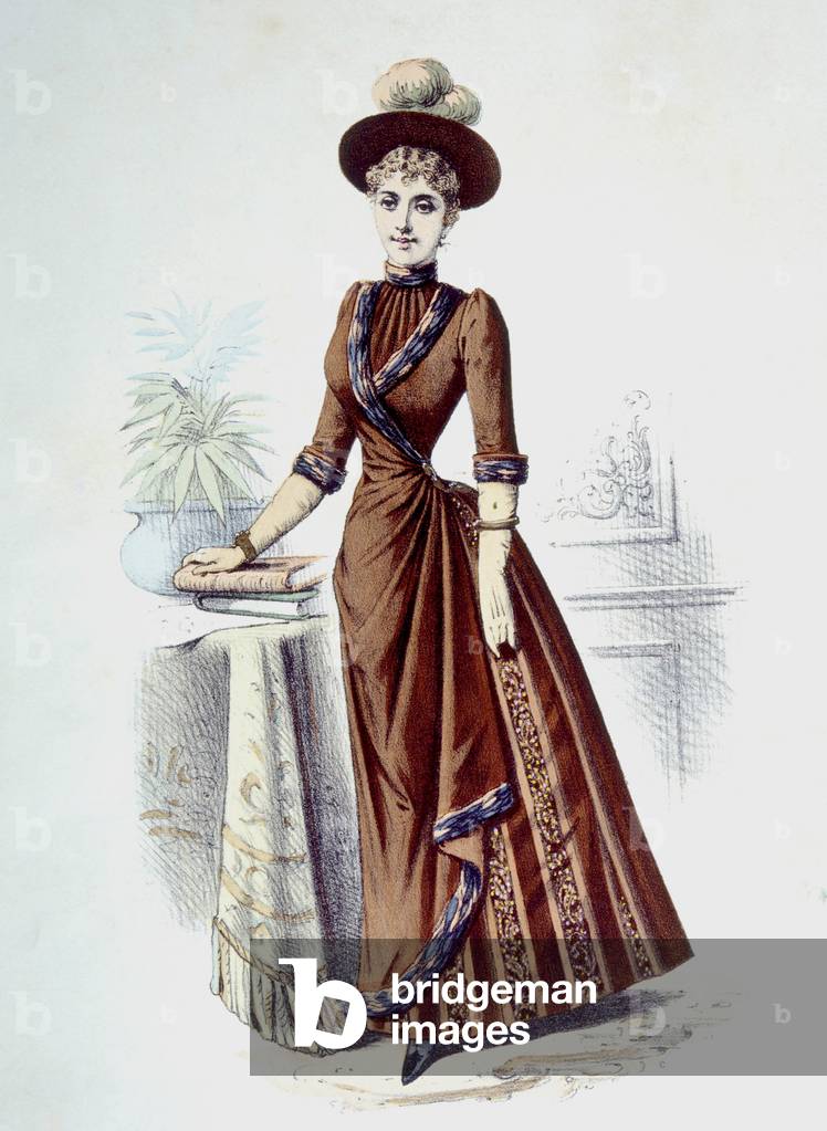 Robe a tournure: Woman wearing a bustle dress, hand-colored engraving, 1889. Photo: Courtesy Everett Collection
