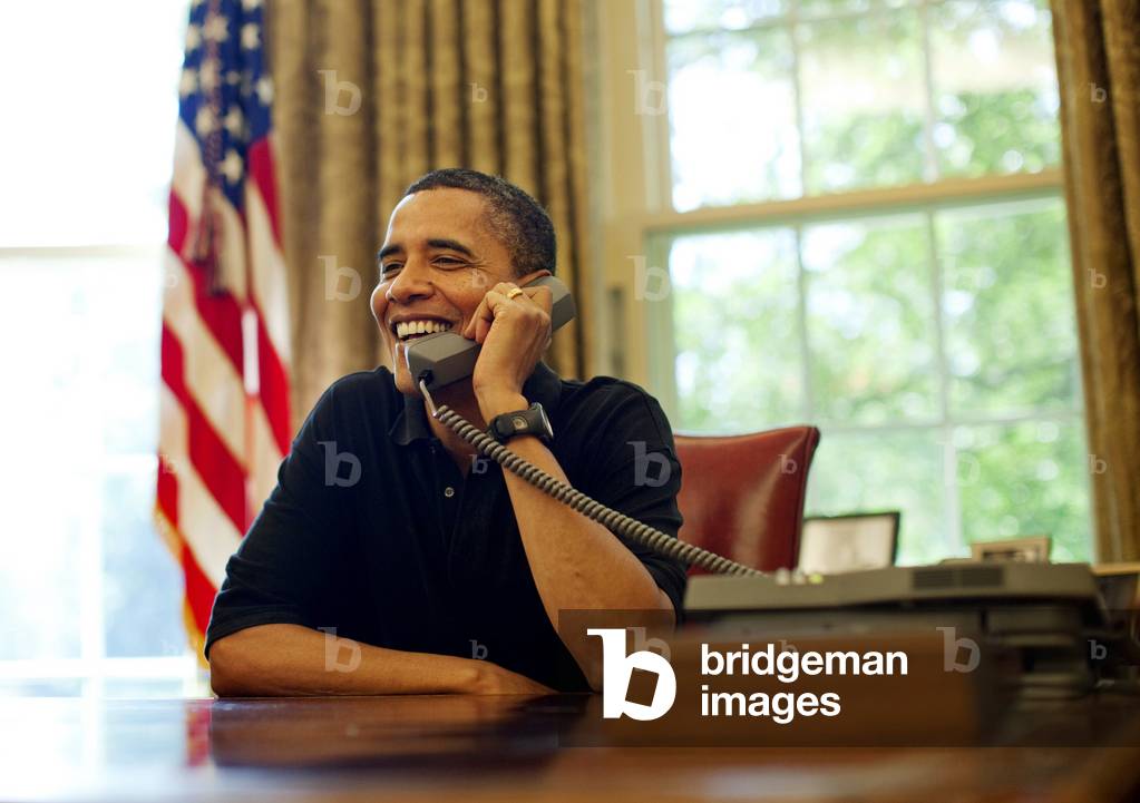 President Barack Obama talks by phone with U.S. Supreme Court Justice nominee Judge Sonia Sotomayor from the Oval Office on Sunday July 12 2009.,