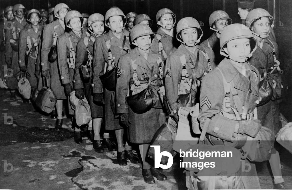 First African American members of the Women's Army Corps assigned to overseas duty arriving in England during the final months of World War II. February 1945