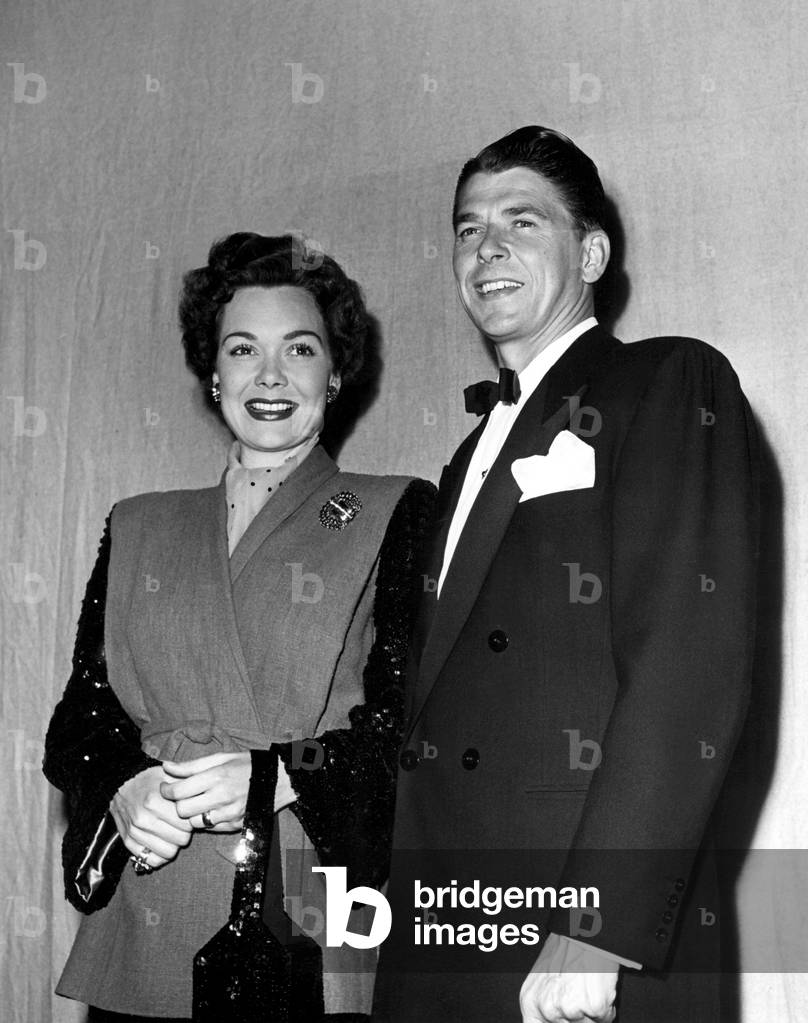 JANE WYMAN and husband RONALD REAGAN at the Academy Awards, 3/13/47