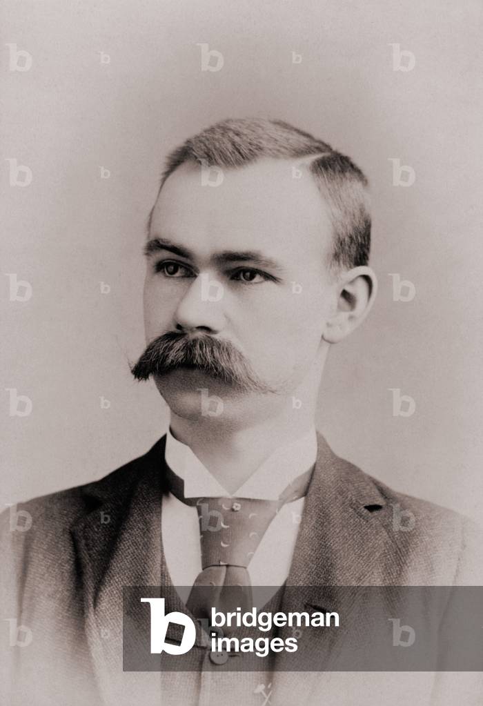 Herman Hollerith (1860-1929), American inventor of a punch card tabulating machine for automating the 1890 U.S. Census. Similar punch cards were used in the early generations of electronic computers. c. 1890