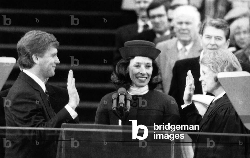 Bush Sr. Presidency. From left: US Vice President Dan Quayle with Marilyn Quayle, being sworn in by Supreme Court Justice Sanda Day O'Connor. Back row: former US President Ronald Reagan. Washington, D.C., January 20, 1989