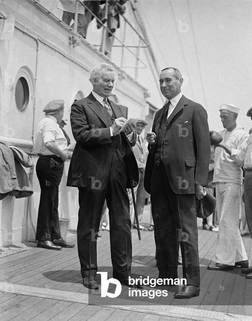 Albert Davis Lasker (right), advertising man and chairman of the U.S. Shipping Board, talks with Illinois Representative Martin B. Madden (left) in 1923